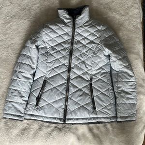 Light puffer-style jacket with zip up pockets. Never been worn. Send best offer.